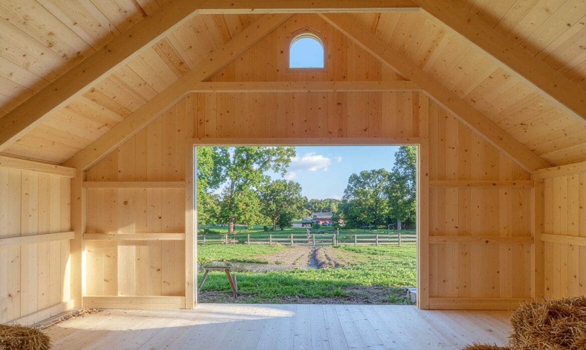 Hay barn sizing diagram showing barn width, wall height, and bay layout for hay storage