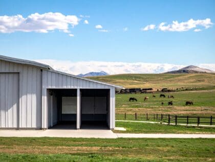 Spacious horse barn layout with large stalls, wide aisles, and room for future expansion